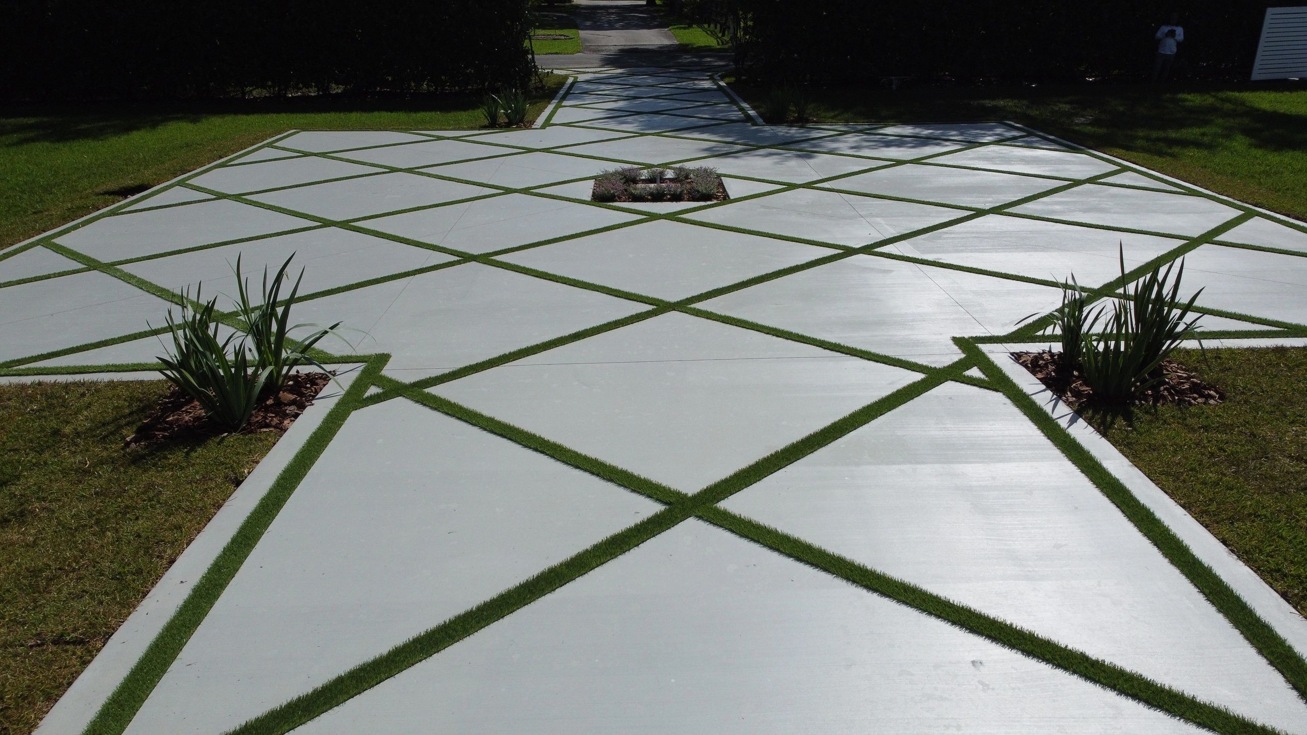 Diamond-pattern concrete and turf driveway, Davie project